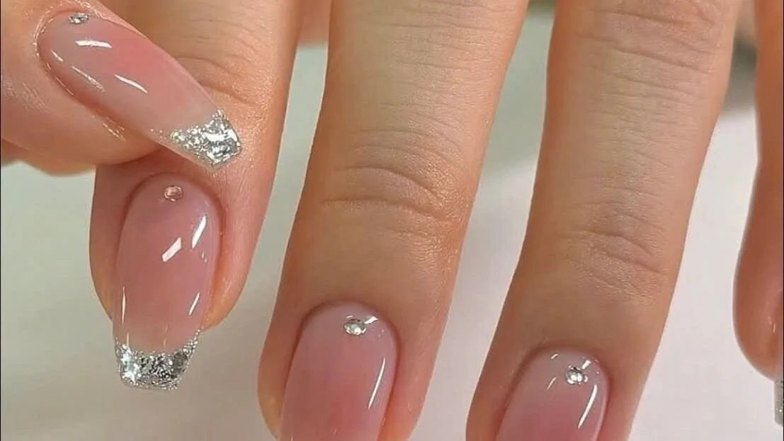 Nude nails with silver glitter tips from the official OS Nails gallery
